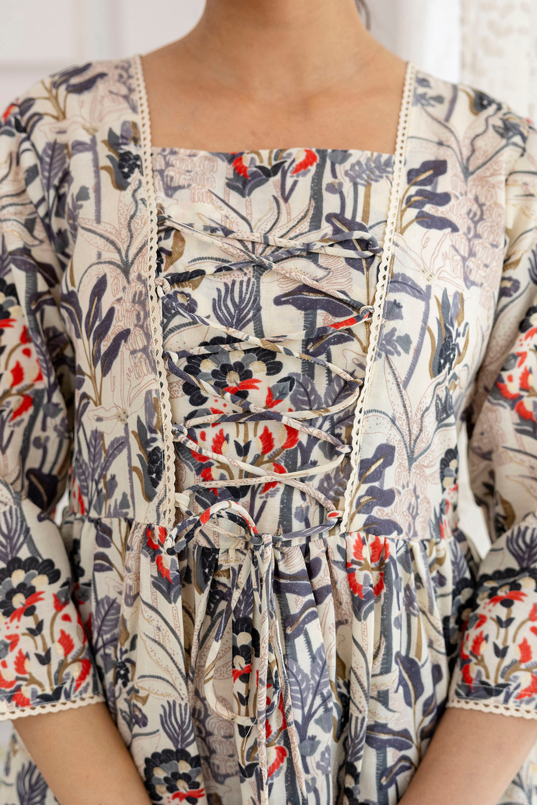 Women Off-White Printed V-Neck Peplum Tunic | LASVINI - Redefining Indian Fashion with Elegance