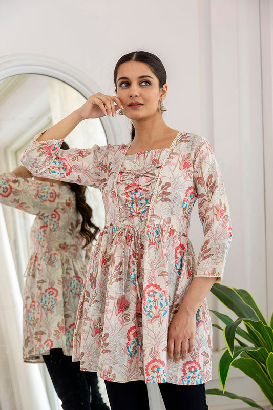 Women Off-White Printed V-Neck Peplum Tunic | LASVINI - Redefining Indian Fashion with Elegance