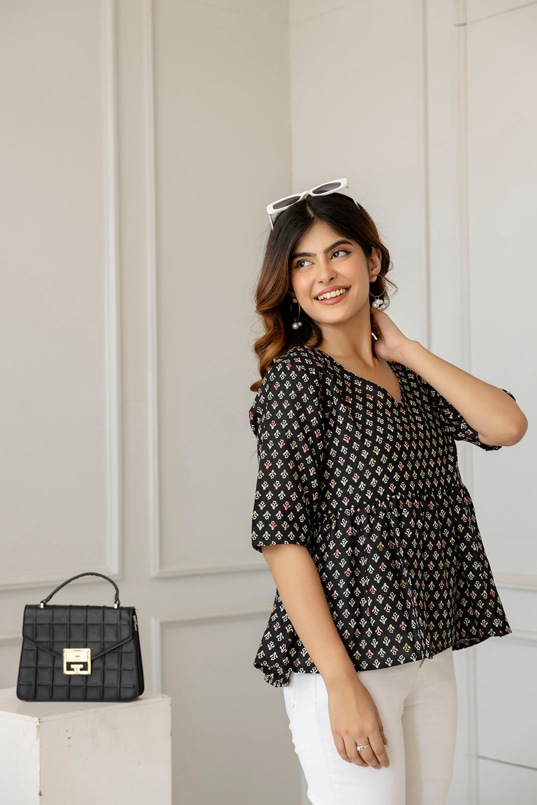 Women Black Printed V-Neck Peplum Tunic | LASVINI - Redefining Indian Fashion with Elegance