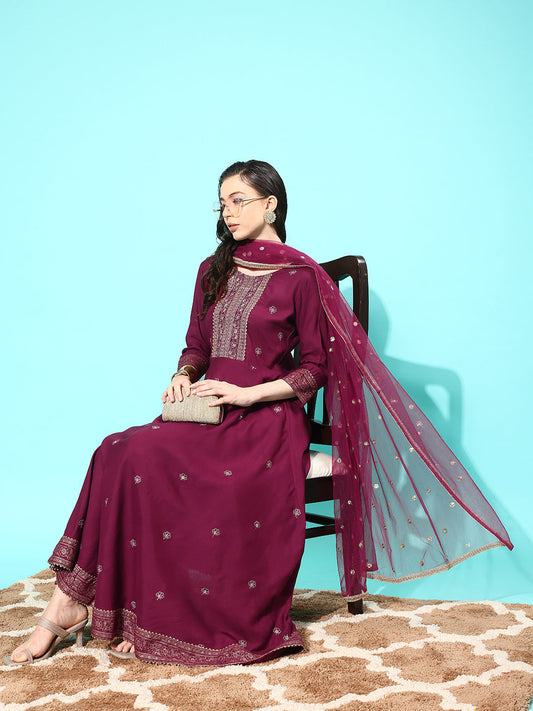 Women Burgundy Embroidered Kurta With Trouser And Net Dupatta | LASVINI - Redefining Indian Fashion with Elegance