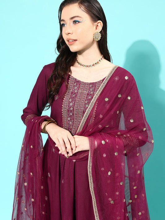 Women Burgundy Embroidered Kurta With Trouser And Net Dupatta | LASVINI - Redefining Indian Fashion with Elegance