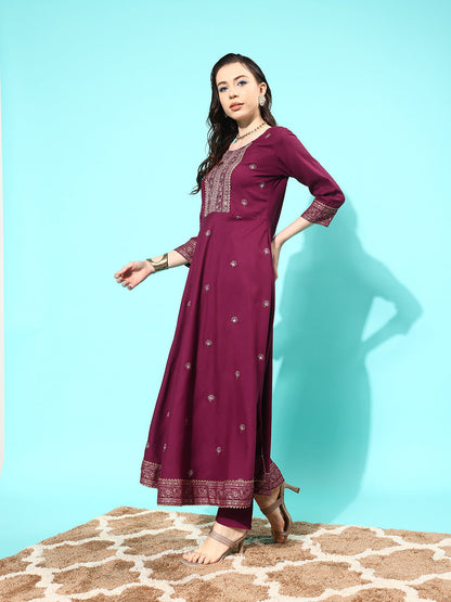 Women Burgundy Embroidered Kurta With Trouser And Net Dupatta | LASVINI - Redefining Indian Fashion with Elegance