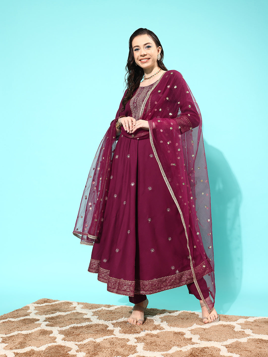 Women Burgundy Embroidered Kurta With Trouser And Net Dupatta | LASVINI - Redefining Indian Fashion with Elegance