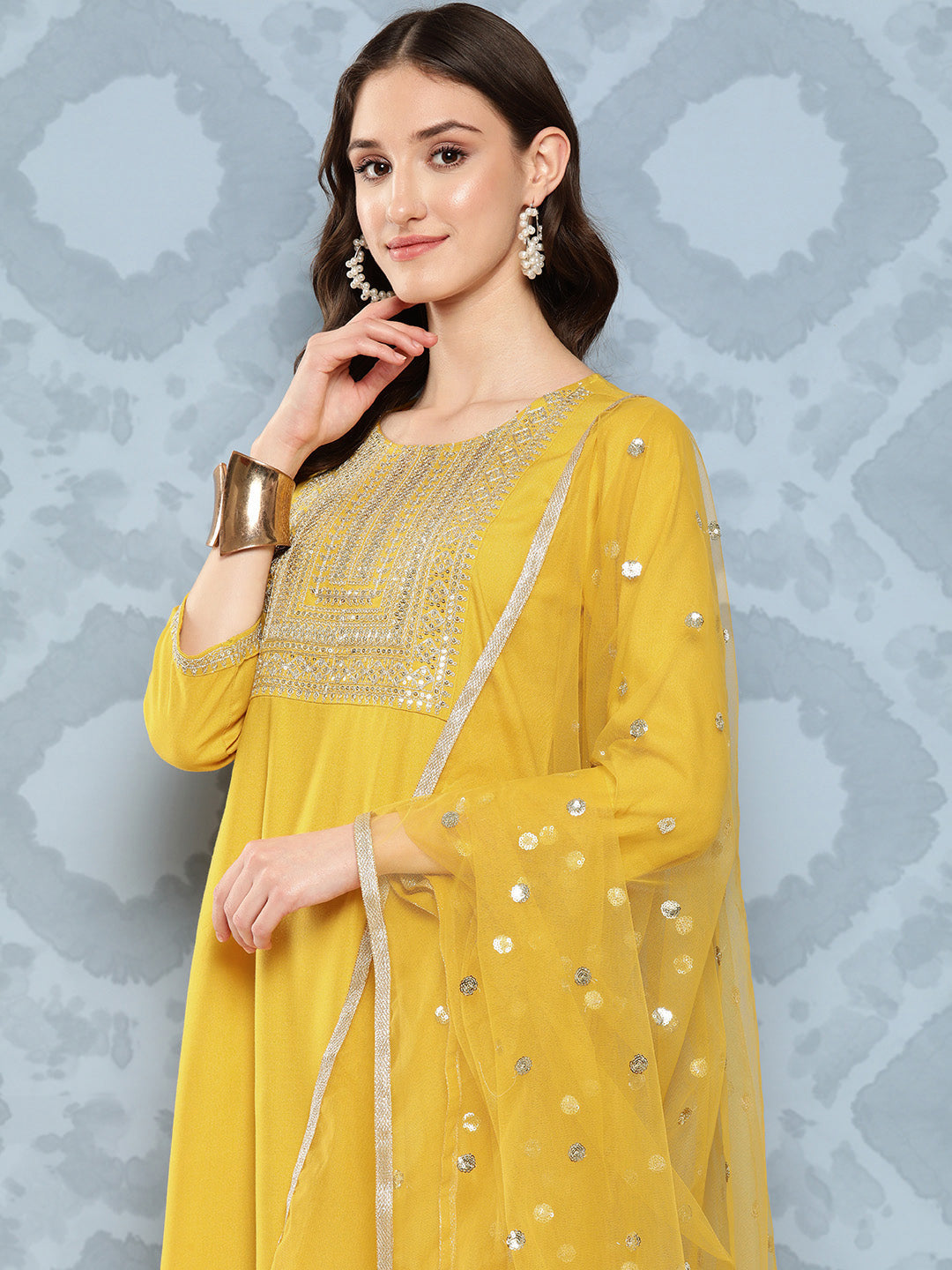 Women Yellow Embroidered Straight Kurta With Palazzo And Net Dupatta | LASVINI - Redefining Indian Fashion with Elegance