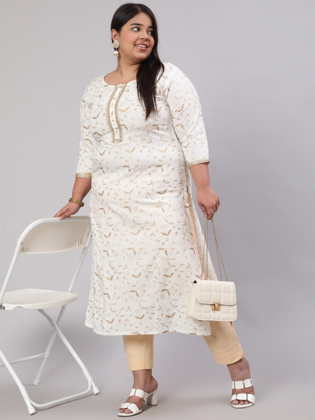 Plus Size Women Off White Printed Straight Kurta With Three Quarters Sleeves | LASVINI - Redefining Indian Fashion with Elegance